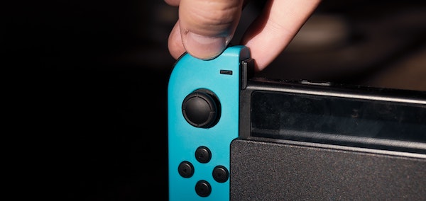 Blue JoyCon — Photo by Matthew Hamilton on Unsplash
