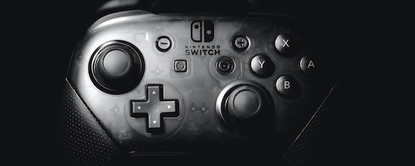 Photo by wu yi on Unsplash - Nintendo Switch Pro Controller